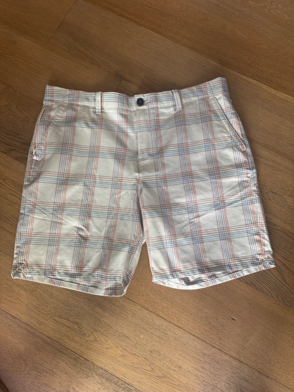 Tommy Bahama beige short with blue and orange plaid.  Excellent condition.